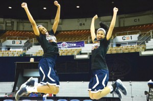 Rickiesha Bryant and Shelby Crawford celebrate after winning their third consecutive OVC Tournament. The Skyhawks beat the Golden Eagles 87-80 in the championship game Saturday night. (Tonya Evans)