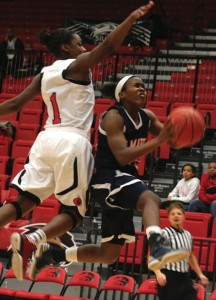 Jasmine Newsome goes up after stealing the ball from SIU Edwardsville. (Tonya Evans)