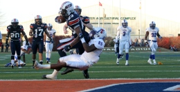 DJ McNeil gets tackled in the end zone on a one-yard run. (Tonya Evans)