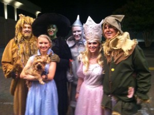 Left to right: Stephen Conner as the Cowardly Lion; Leslie Patterson as Dorothy Gale holding Toto the dog; Maggie Olmstead as the Wicked Witch; UTM student Alton Alexander as the Tin Man; Trish Perry as Glinda the Good Witch; and John-Alex Warner as the Scarecrow.  (Delinda Goad)