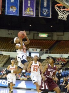 Jasmine Newsome goes for a layup to help increase the Skyhawks lead. (Tonya Evans)