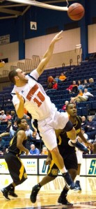 Mike Liabo soars through the air as he goes for a successful shot. (Kevin Long)