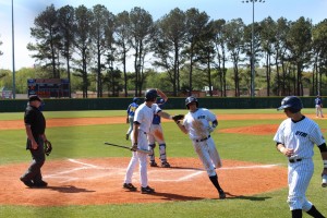 Byron Johann scoring a run in the bottom of the sixth while trying to bring his team back. (Bradley Stringfield)