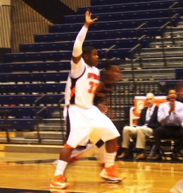 Myles Taylor pulls a pose as he guards his man. (Kristen Harrelson)