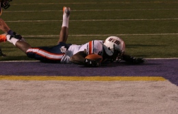 Chris Thompson falls into the end zone to send the game into overtime. (Tonya Evans)
