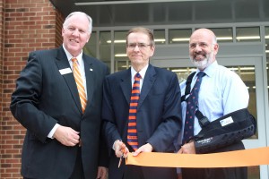 Chancellor Dr. Tom Rakes, Vice Chancellor for Academic Affairs Dr. Jerald Ogg and UT President Dr. Joe DiPietro cut the ribbon in front of the new Fine Arts Building, welcoming the crowd inside for a tour. (Alex Jacobi)