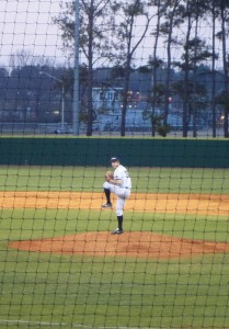 Pitcher Dan Tobik positions on the mound before he adds another strikeout to the night's game. (Bradley Stringfield)