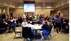 People gathered in the ballroom for snacks at the benefit. (Ellee Agee)