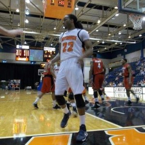 Justin Childs steps over the boundary line to take the ball out. (Jenifer Nicks)