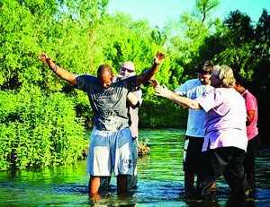 Brent Acker being rebaptized in a river in Bulgaria. (Brent Acker)