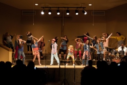 Professional music fraternity Sigma Alpha Iota performs the exhibition act of the night, “Oops, We Did It Again,” featuring the songs, “All Star,” “Iris,” “All the Small Things,” “Oops, I Did It Again,” “Say My Name,” “This Is How We Do It,” “Fresh Prince of Bel-Air,” “Sister, Sister,” “I’ll Be There For You” and “Closing Time.” After performing, they received a plaque, thanking them for participating. (Malorie Paine)