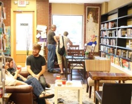 Students and members of the community enjoy company, coffee and books at Wonderland Books and Games.