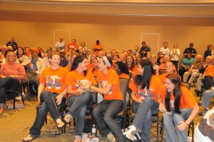 The Skyhawk women’s basketball team members celebrate after finding out Monday night whom they will face in the first round of the NCAA tournament. Campus and community members joined the team for the selection show, held in UTM’s Duncan Ballroom. (Joshua Lemons)