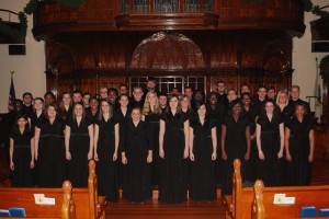 The New Pacer Singers prepare for a concert at the First Presbyterian Church of Portland, Ore. with Director of Choral Activities, Dr. Mark Simmons. (Alex Jacobi)