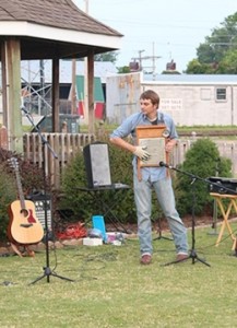 Daniel Musgrave takes a break from lead vocals and guitar to play the washboard. (Malorie Paine)