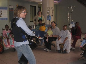 Dr. Julie Hill facilitates a drum circle at St. Jude Children's Hospital in Memphis, Tenn. (Julie Hill)