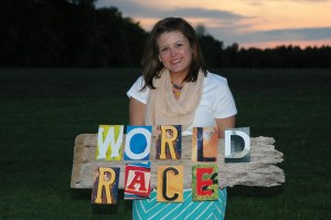 Jena Bea Haney holding World Race sign; which she begins on Sept. 10. (Jena Bea Haney)