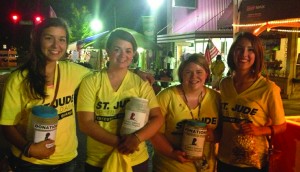 Members of the UTM Up 'til Dawn Executive Committee walked the crowd during the Soybean Festival Saturday, Sept. 6 asking for donations. Those volunteers included (from left) Team Cultivation Chair Roslyn Moseley, Assistant Director Alison Nutt, Mission Chair Allison Griswold and Executive Director Katie Jarvis. The Up 'til Dawn volunteers raised $1,425.59. (Kenny Friend)