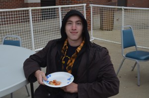 Cody Burress, a visitor to the foreign country, remained completely silent for over an hour while participating in the First Amendment Free Food Festival. Burress followed all laws set forth by the Kingdom of the Socialist States of the People's Republic of Martin." (Alex Jacobi)
