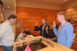 SGA Chief Justice William Morris swears in the newly-appointed members of SGA: (L to R) Elections Commissioner Sarah Appleton, Senator of the College of Engineering and Natural Sciences Toya White and Senator-At-Large Colin Watts. The three were nominated by SGA President Alex Wilson and received a unanimous vote of approval by the senate and Freshmen Council Thursday night.(Mary Jean Hall)