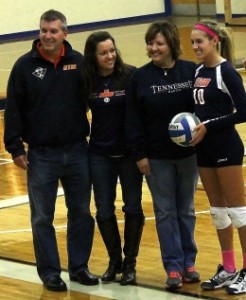 Kasey Elswick beams as she is awarded OVC's all-time leader in digs. (Ashley Cunningham)