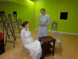 Emily Webb (Kait Scott) and Mrs. Webb (Maggie Olmstead) sit at their kitchen table and enjoy conversation. (Becca Partridge)