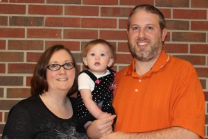 Barbara Kunkel, laboratory instructor of Mathematics and Statistics, is happy to take time out of her busy schedule to pose for a picture with her daughter Raven and husband Curtis Kunkel, associate professor of Mathematics and Statistics. (Sheila Scott)
