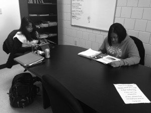Ashley Mendez (left) and Kenisha Champion (right) study before their next class in one of the study rooms in Humanities. (Blake Stevens)