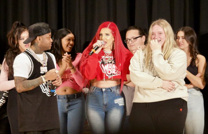 Conceited and Justina Valentine on stage with some of the participants.