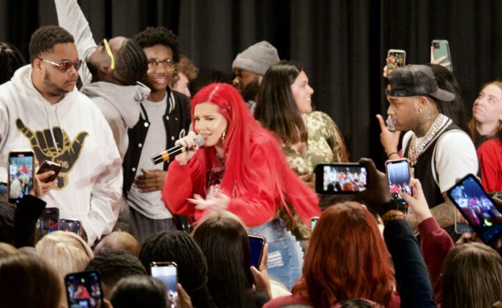 Justina Valentine and Conceited performs on stage. 