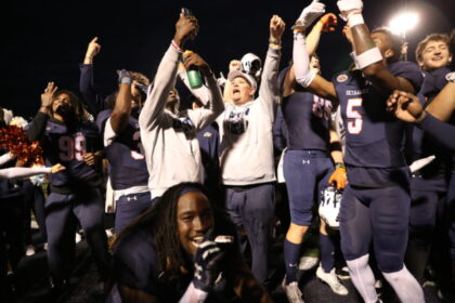 2023 football team celebrating after winning the OVC championship against SEMO
