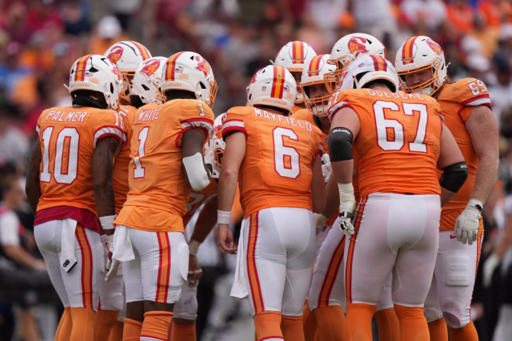 Tampa Bay Buccaneers quarterback Baker Mayfield (6) tells his offense the play in a huddle against the Atlanta Falcons at Raymond James Stadium on Oct. 27, 2024. (Photo Credit / AP Photo/Peter Joneleit)